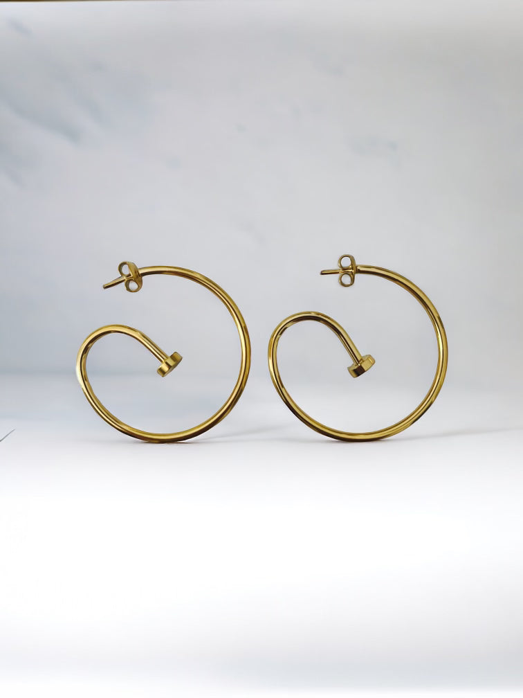 BOUCLES D'OREILLE CLOU